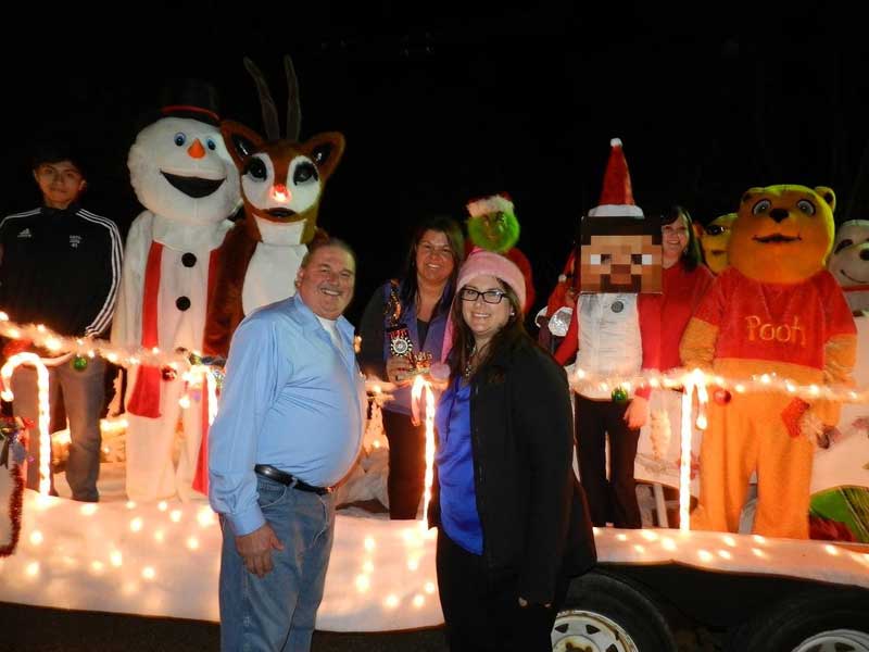 The Cheli family takes thrid place in the tree lighting contest.